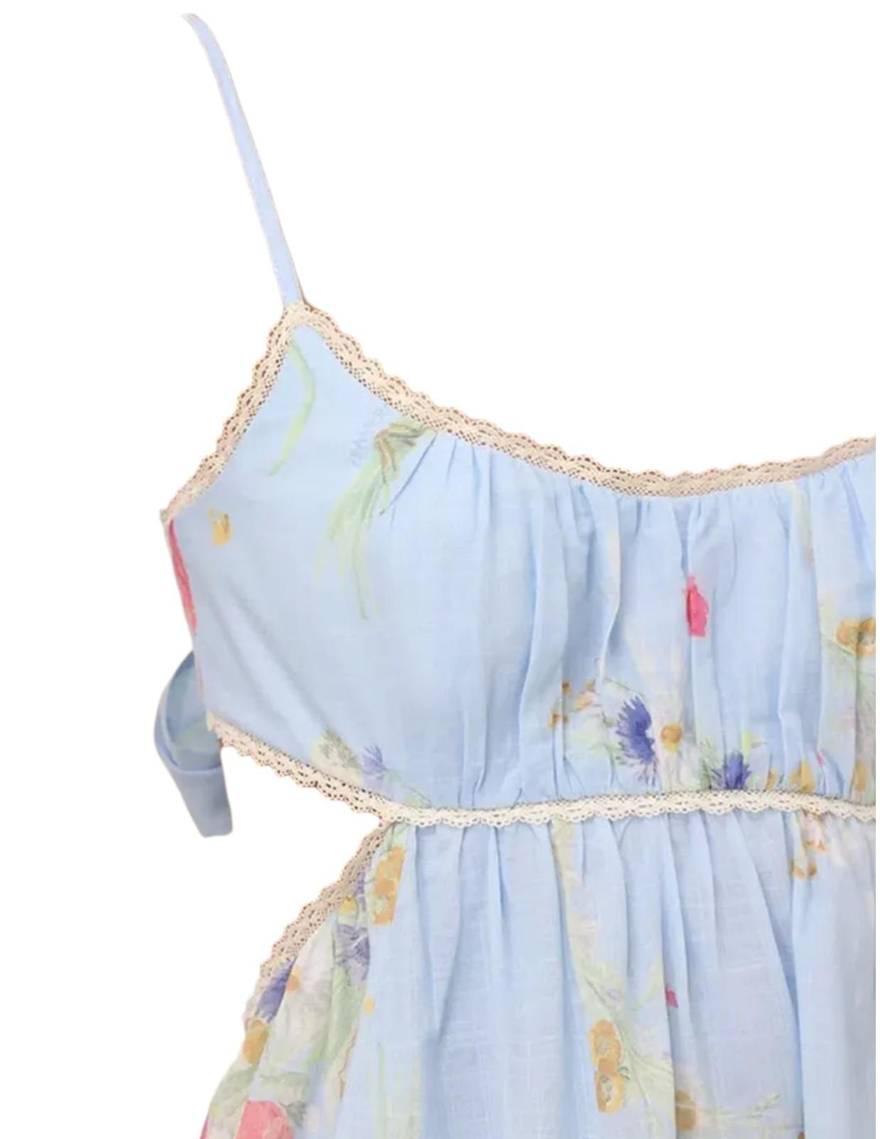 Light blue floral dress with thin straps on a white background