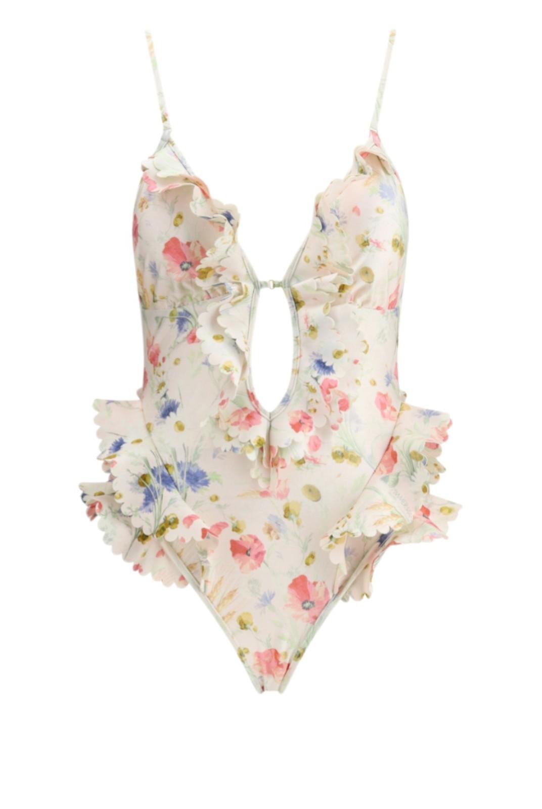 Floral swimsuit with ruffled details on a white background