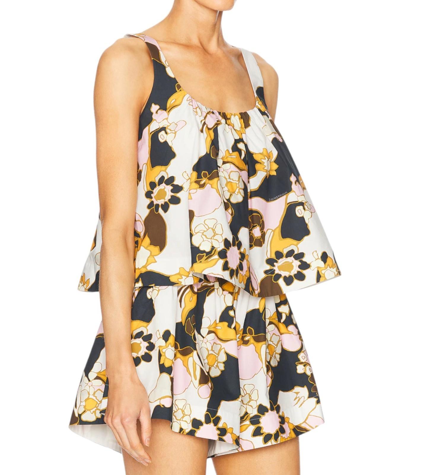 Woman wearing a floral dress on a white background