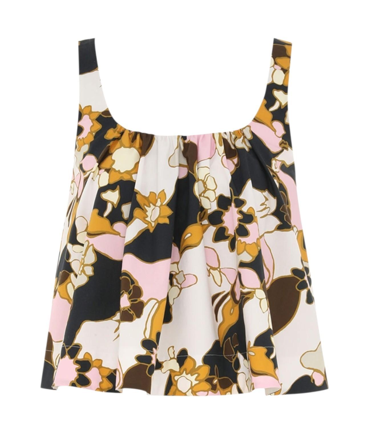 Floral patterned dress with colorful design on a white background