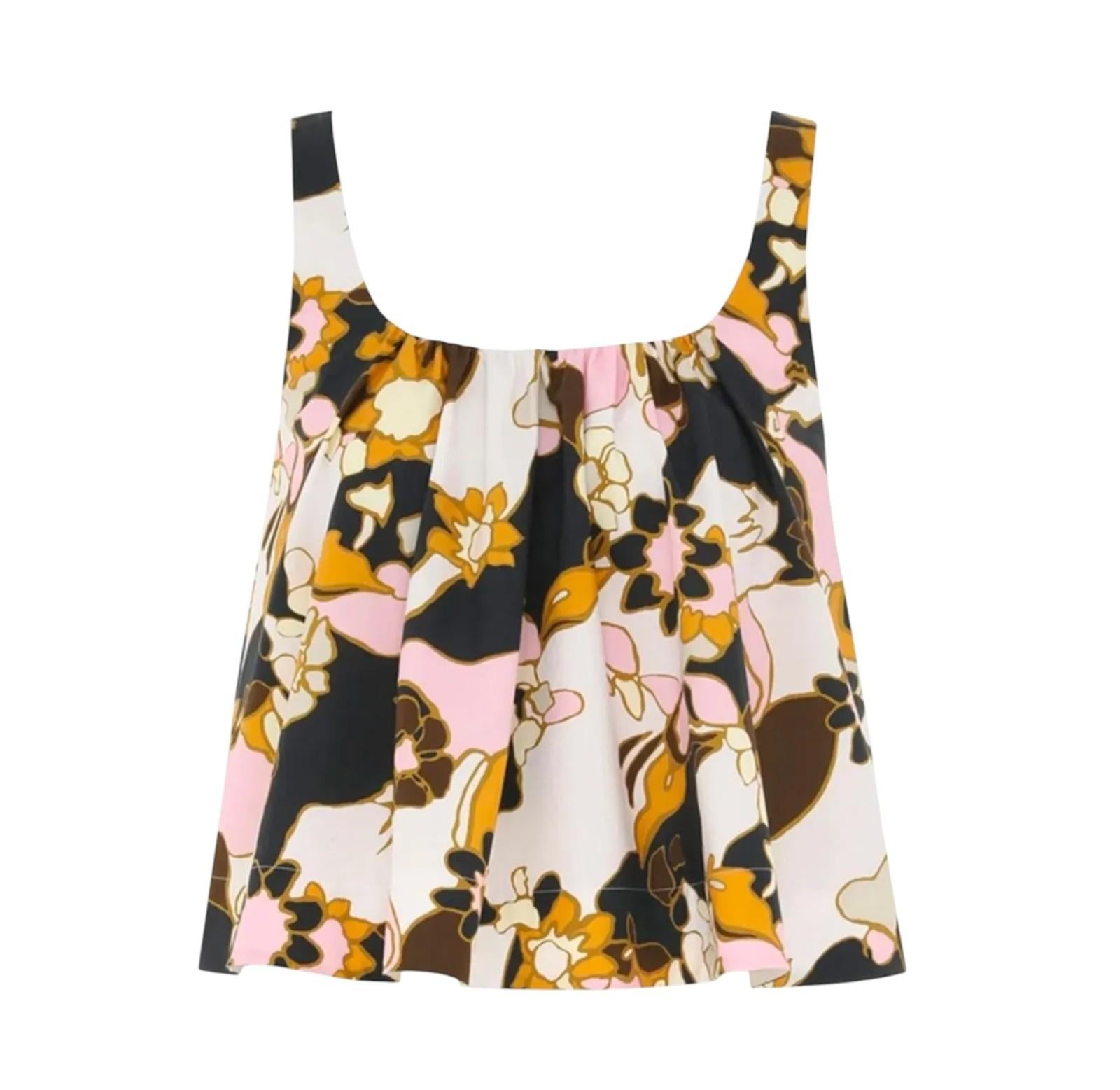 Floral patterned dress with black straps on a white background