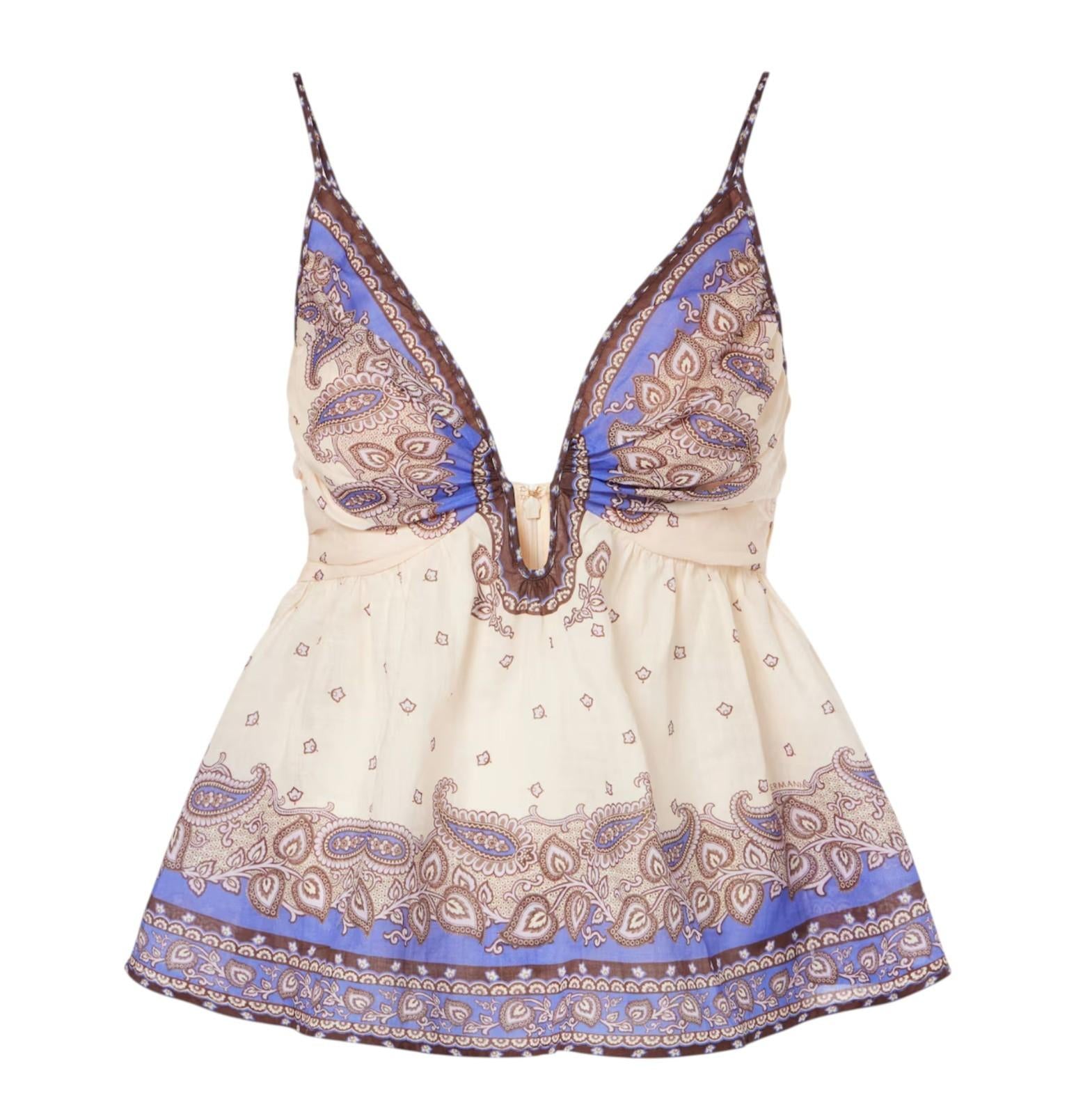 Beige dress with blue and brown pattern on a white background