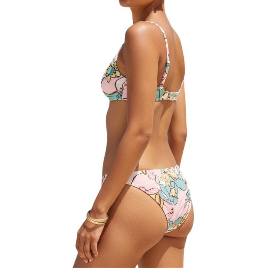 AI generated image of Woman wearing a floral bikini on a white background