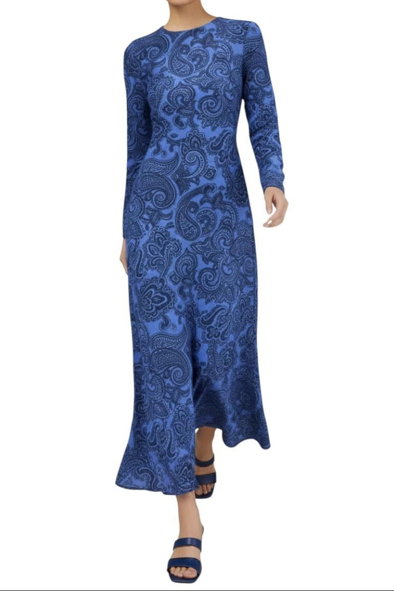 AI generated image of Blue patterned dress worn by a person on a white background