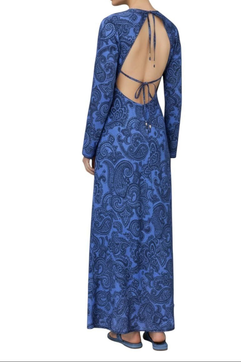 Blue patterned dress with open back on a white background