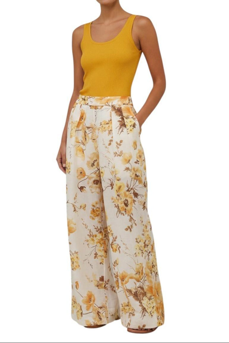 AI generated image of Woman wearing a yellow tank top and floral pants on a white background