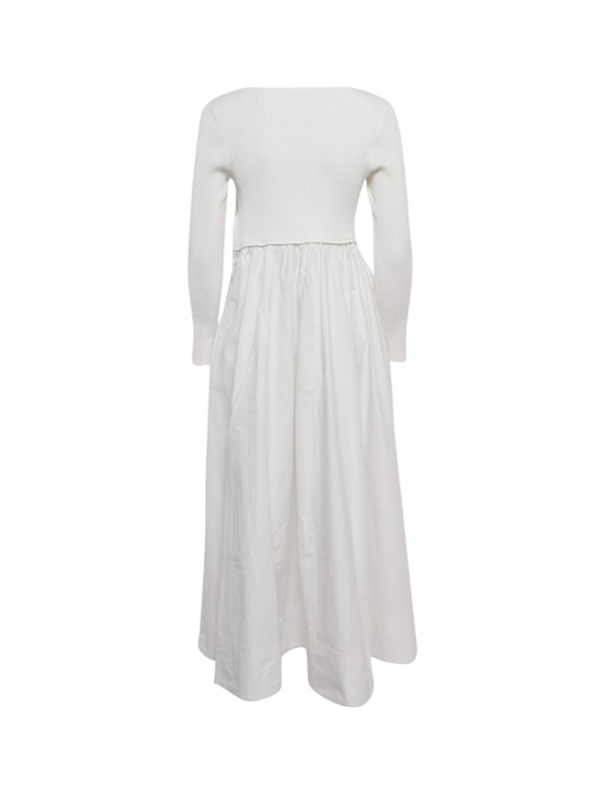 White long-sleeve top and pleated skirt set on a white background