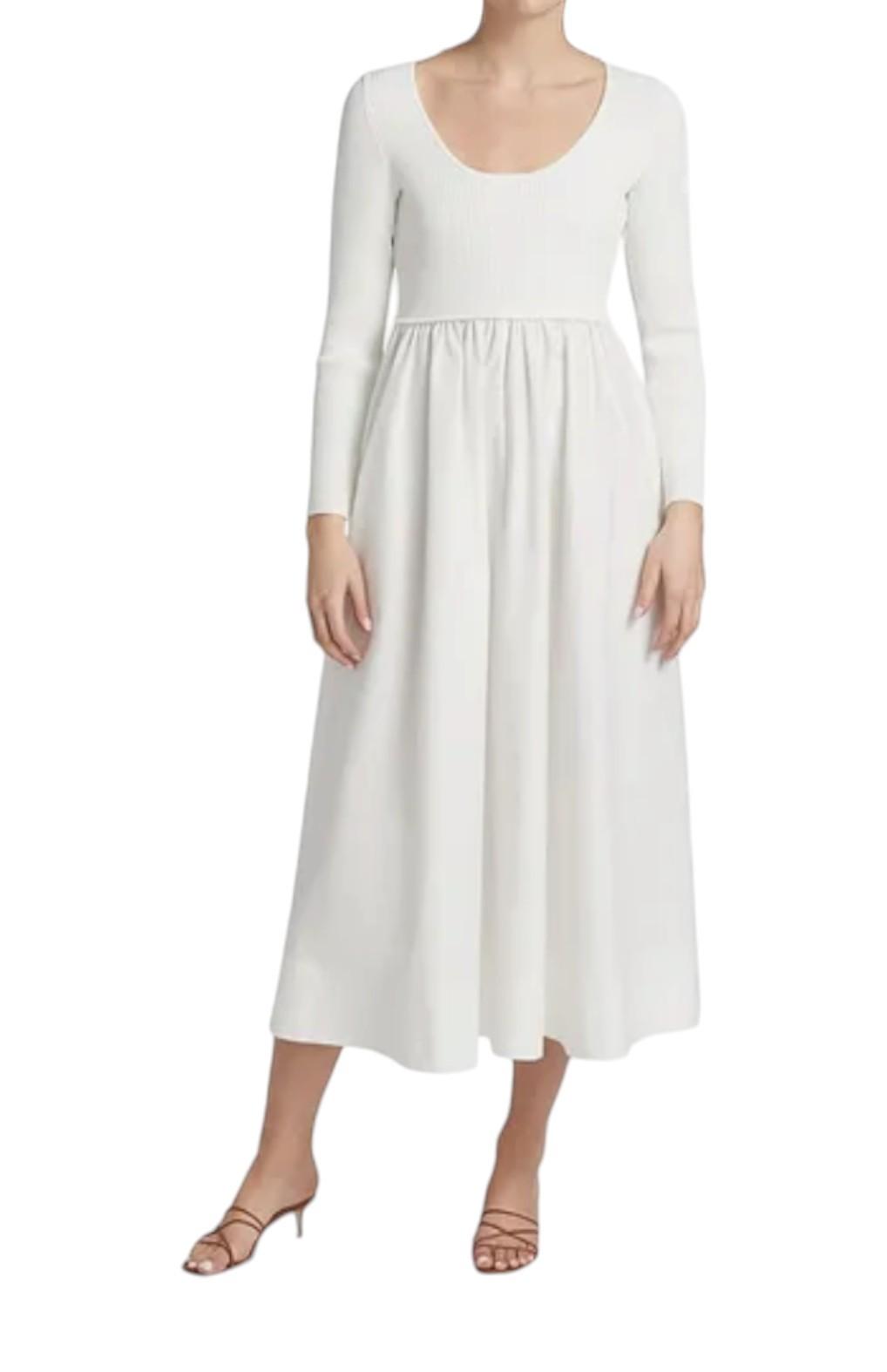 White long-sleeve dress worn by a person on a white background