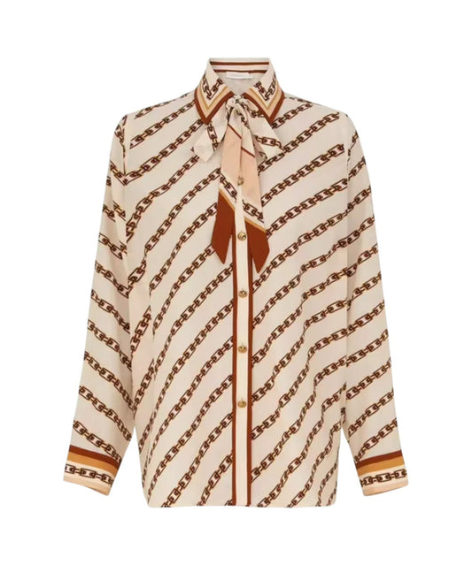 Beige blouse with brown chain pattern on a white background