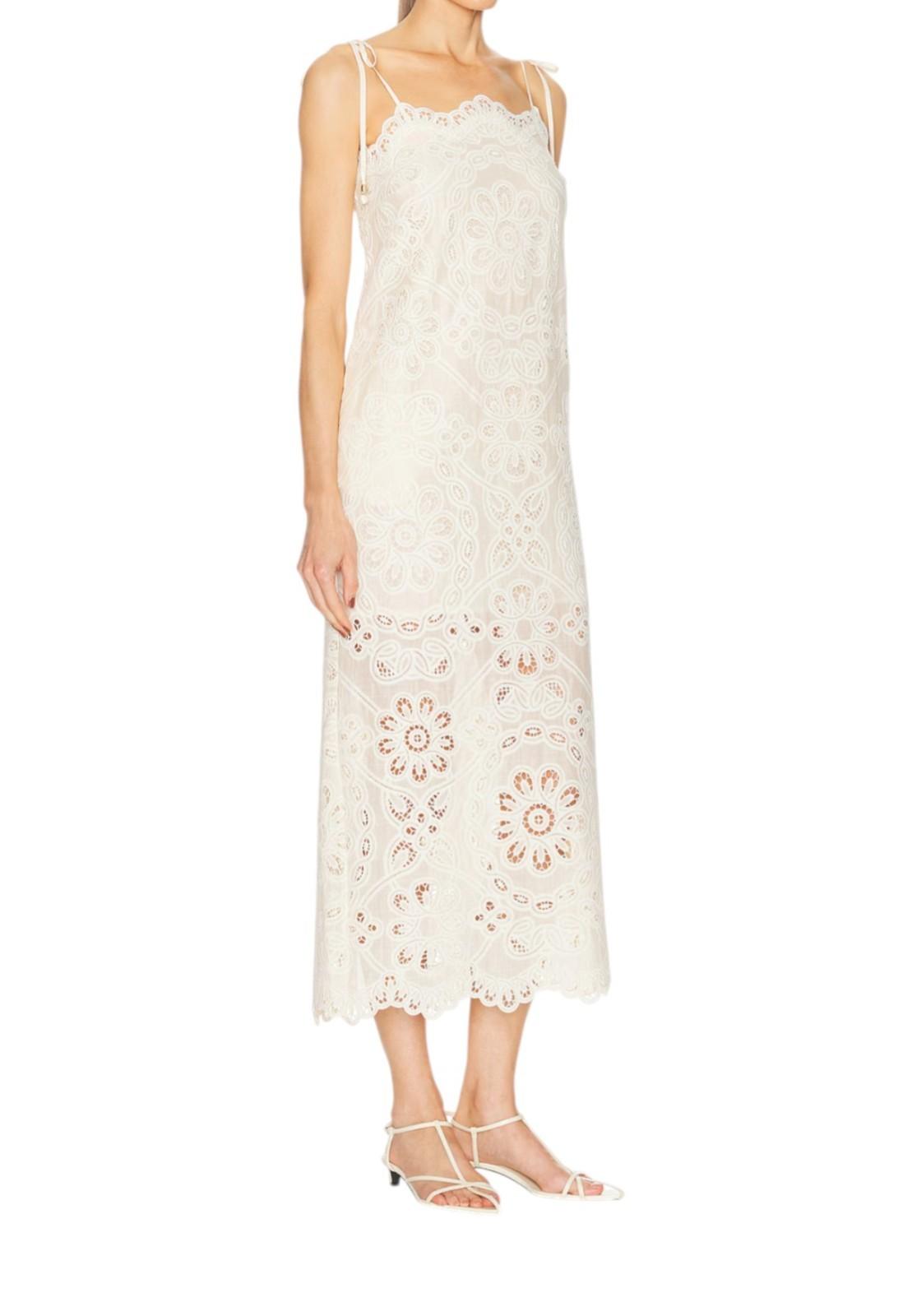 White lace dress with floral patterns on a white background