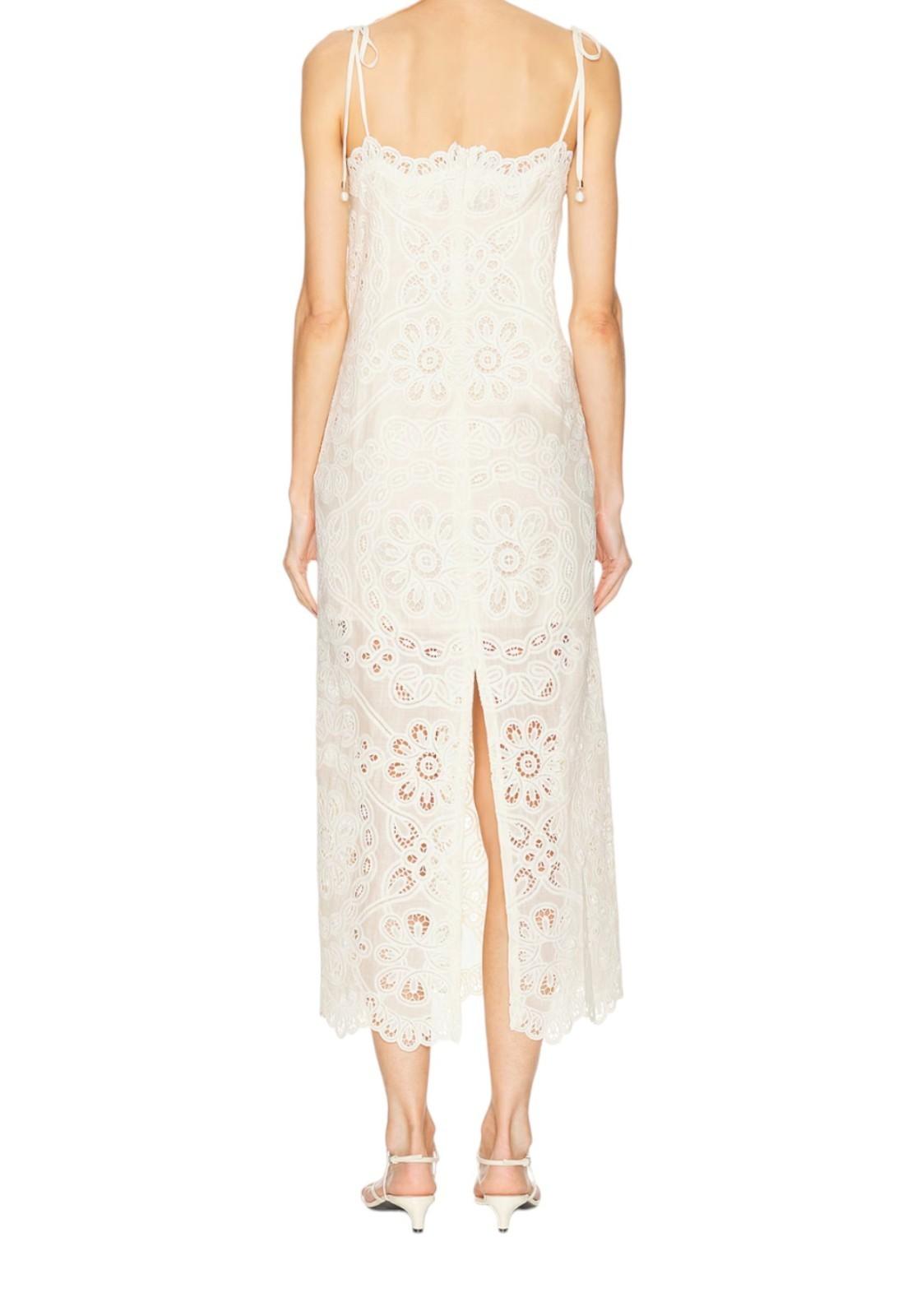 White lace slip dress on a white background