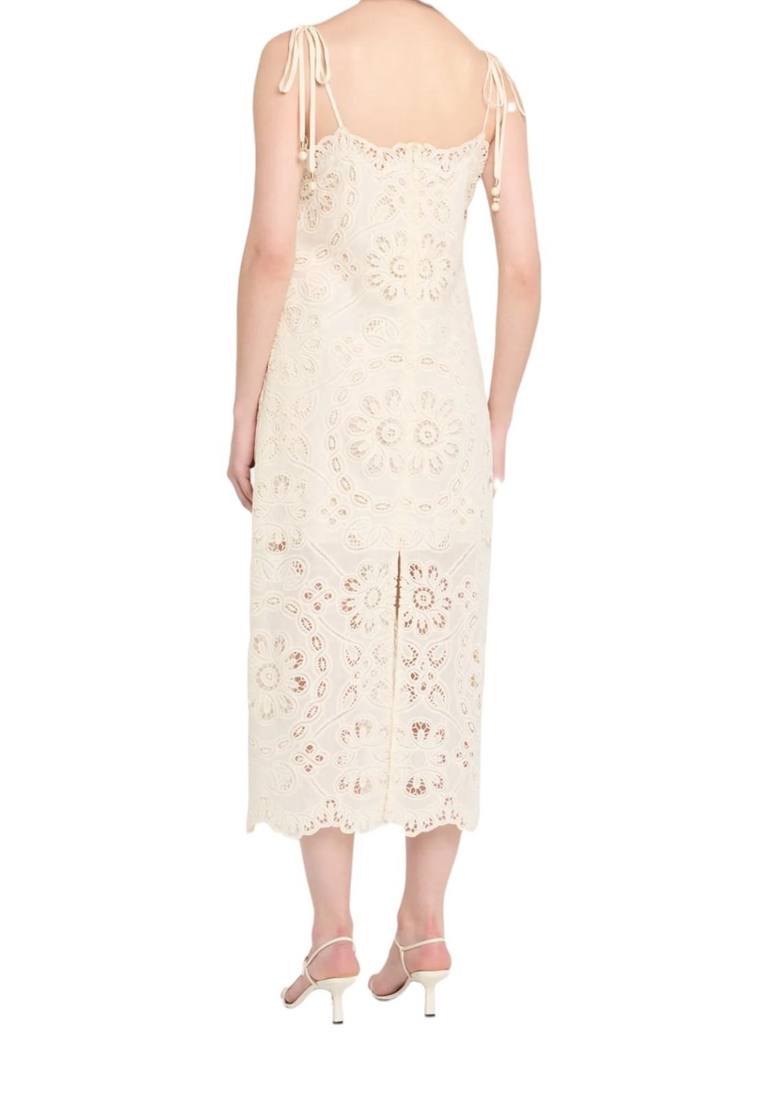 White lace dress with floral patterns on a white background