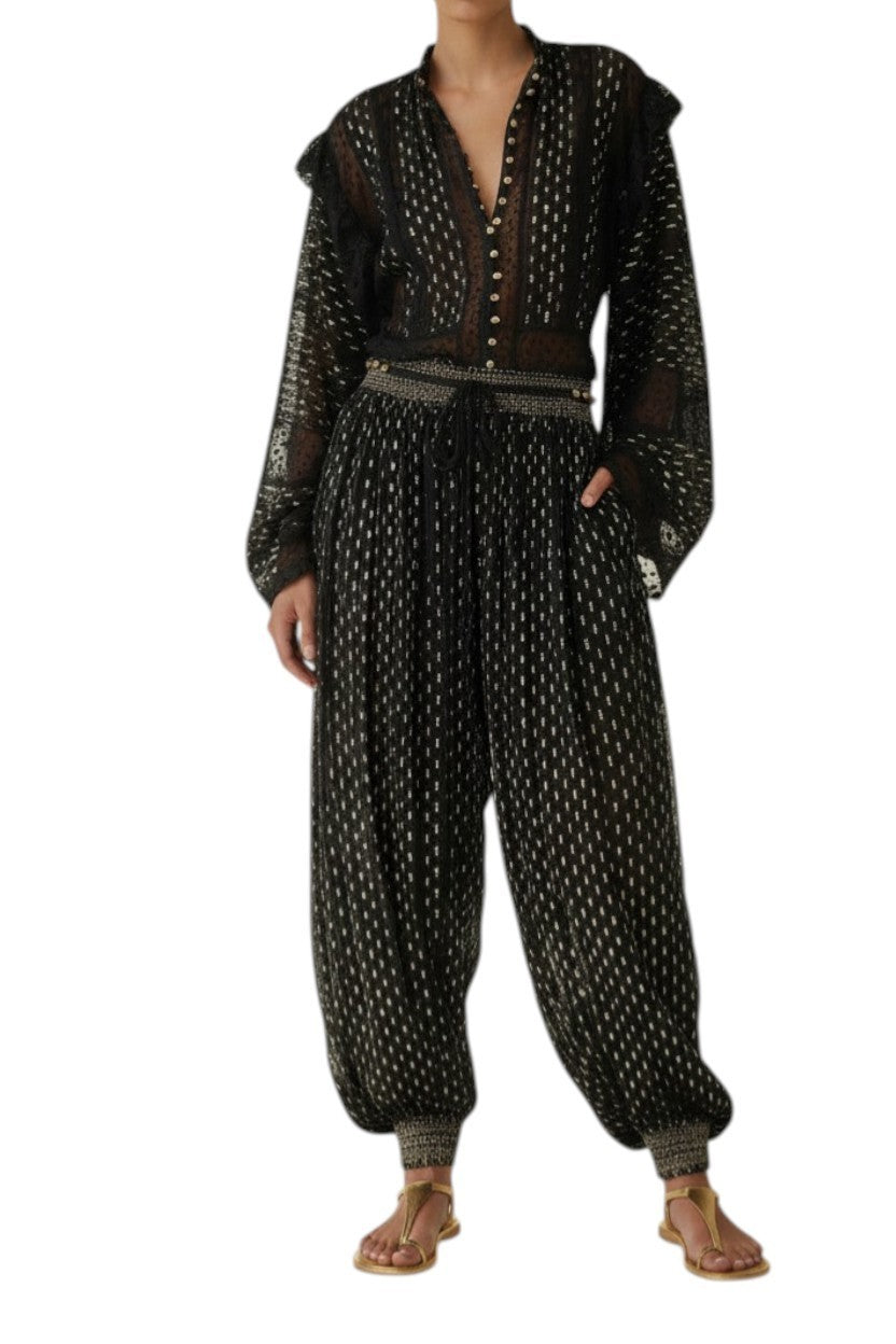 AI generated image of Person wearing a black patterned jumpsuit on a white background