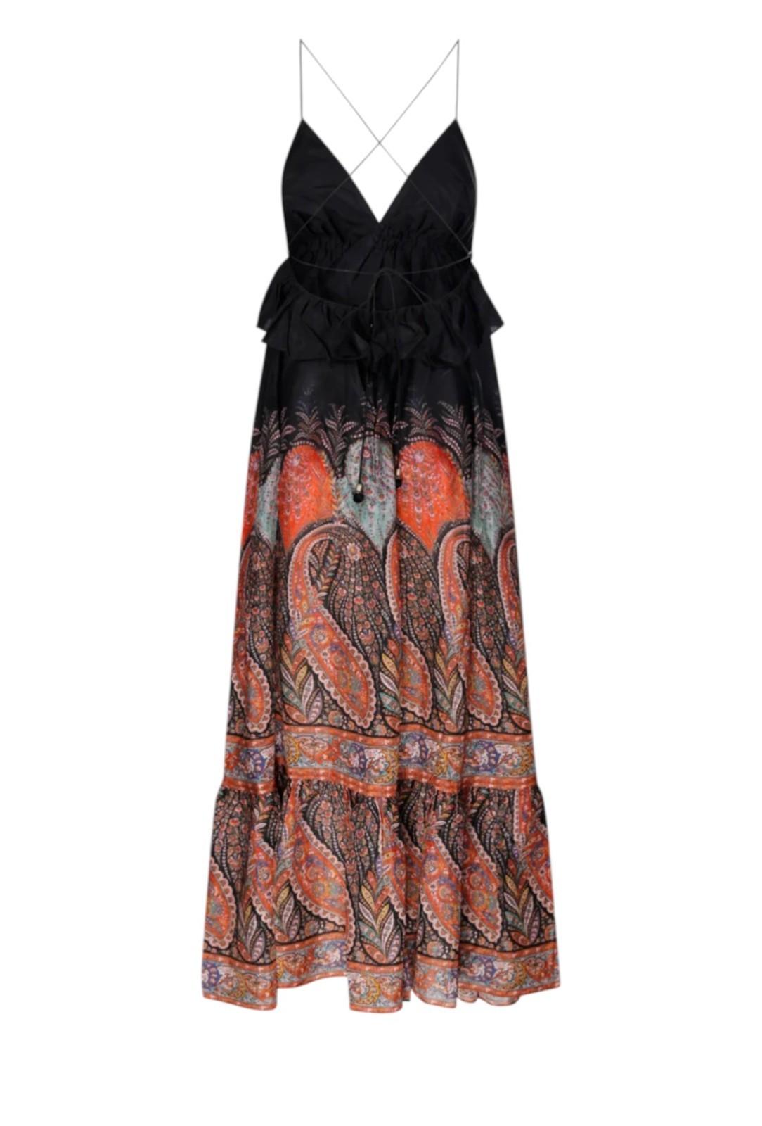Black and patterned long dress on a white background