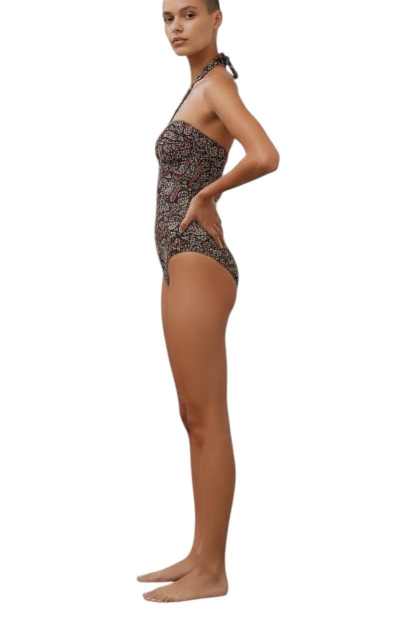 AI generated image of Woman wearing a patterned swimsuit on a white background