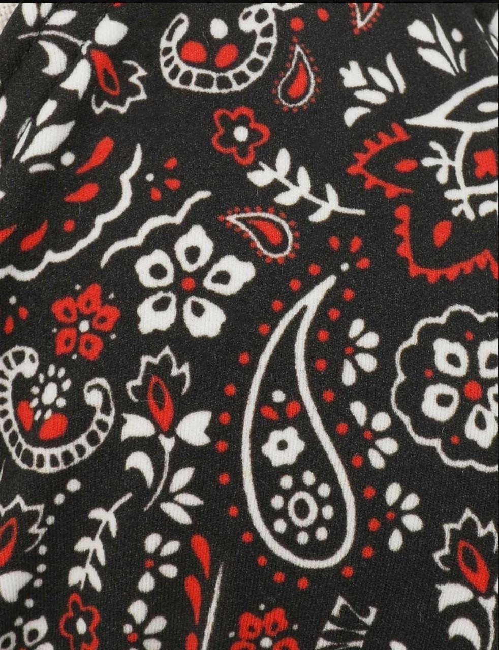 Black fabric with red, white, and gray paisley pattern
