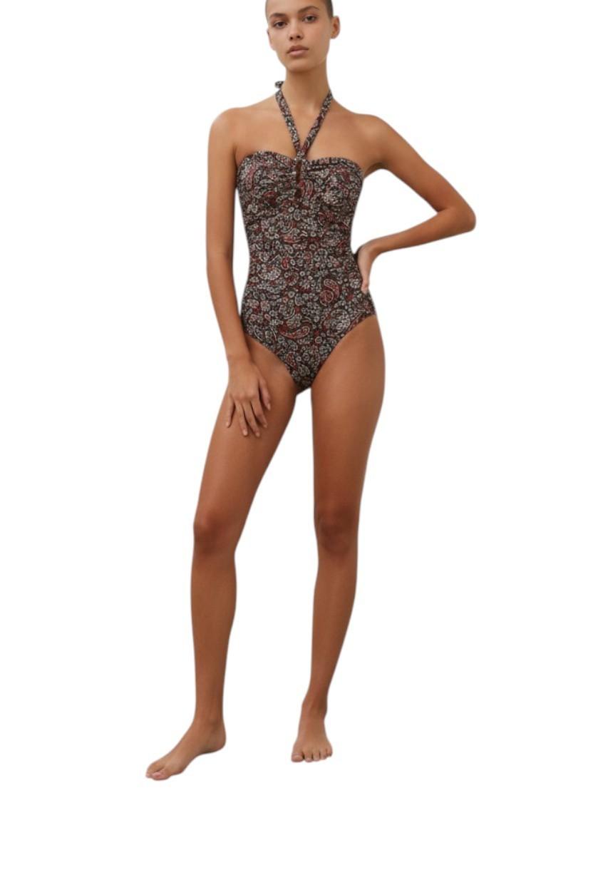 Woman wearing a floral strapless swimsuit on a white background
