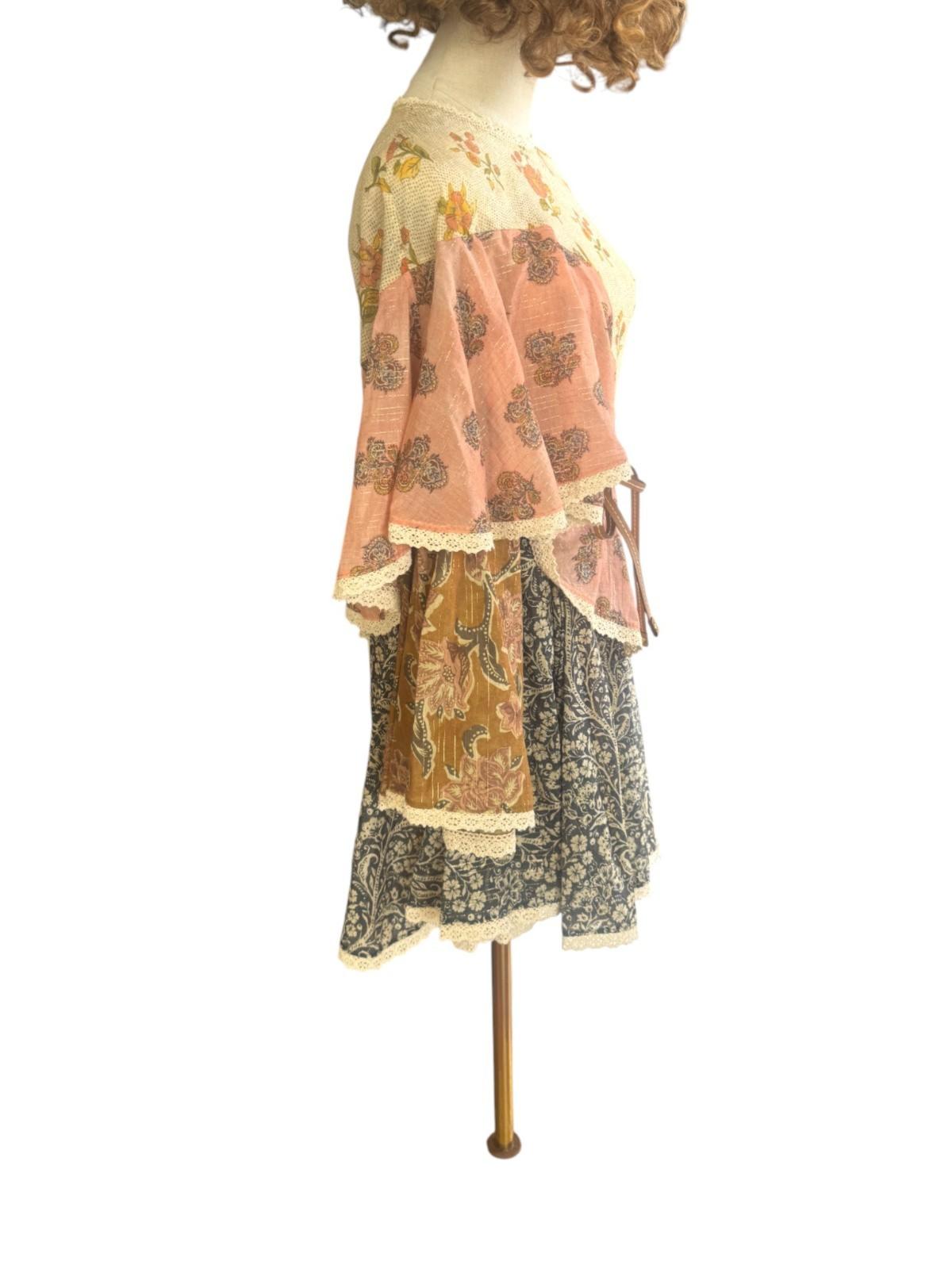 Mannequin wearing a floral dress with a patterned jacket on a white background