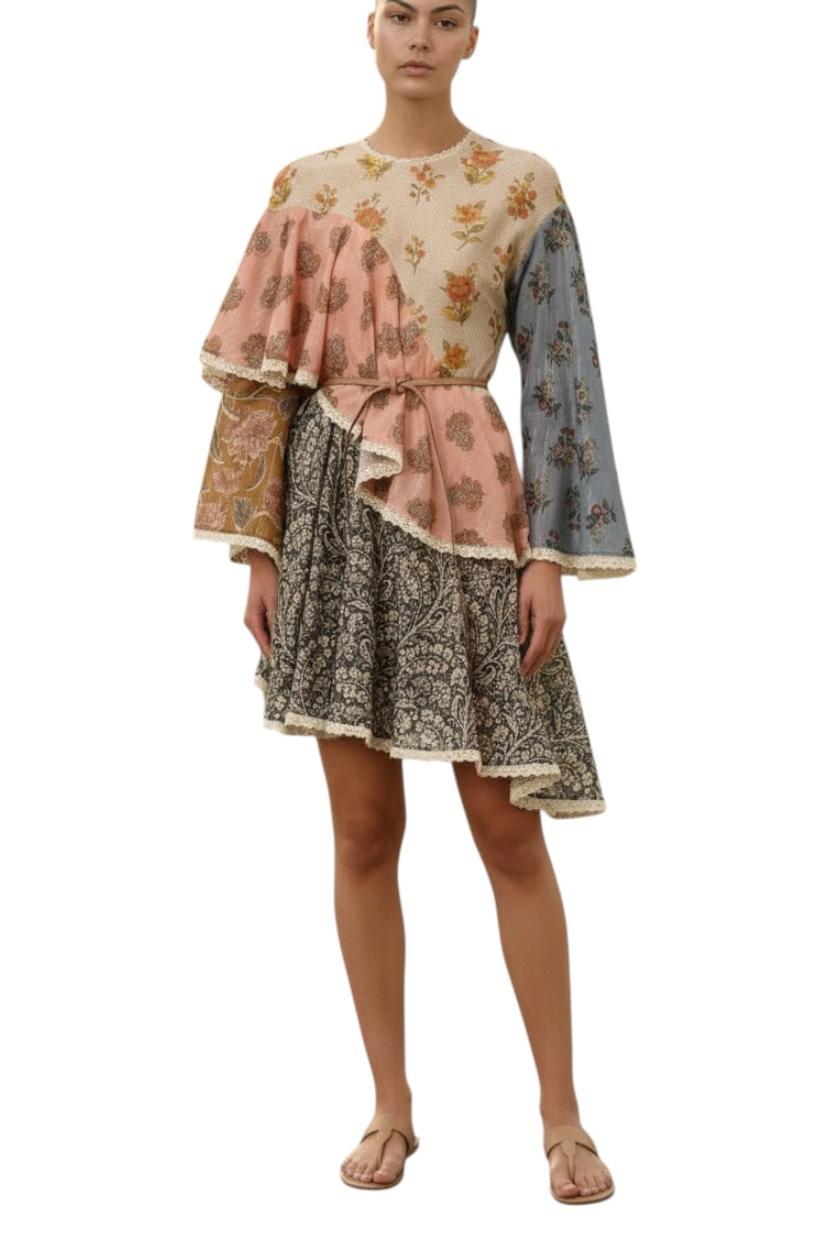 AI generated image of Woman wearing a layered dress with floral and paisley patterns on a white background