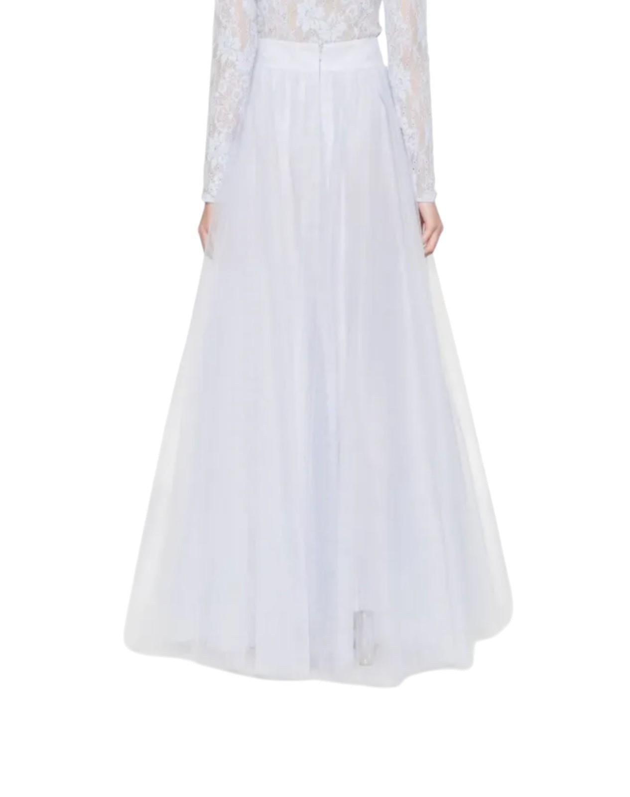 White dress with lace details on a white background