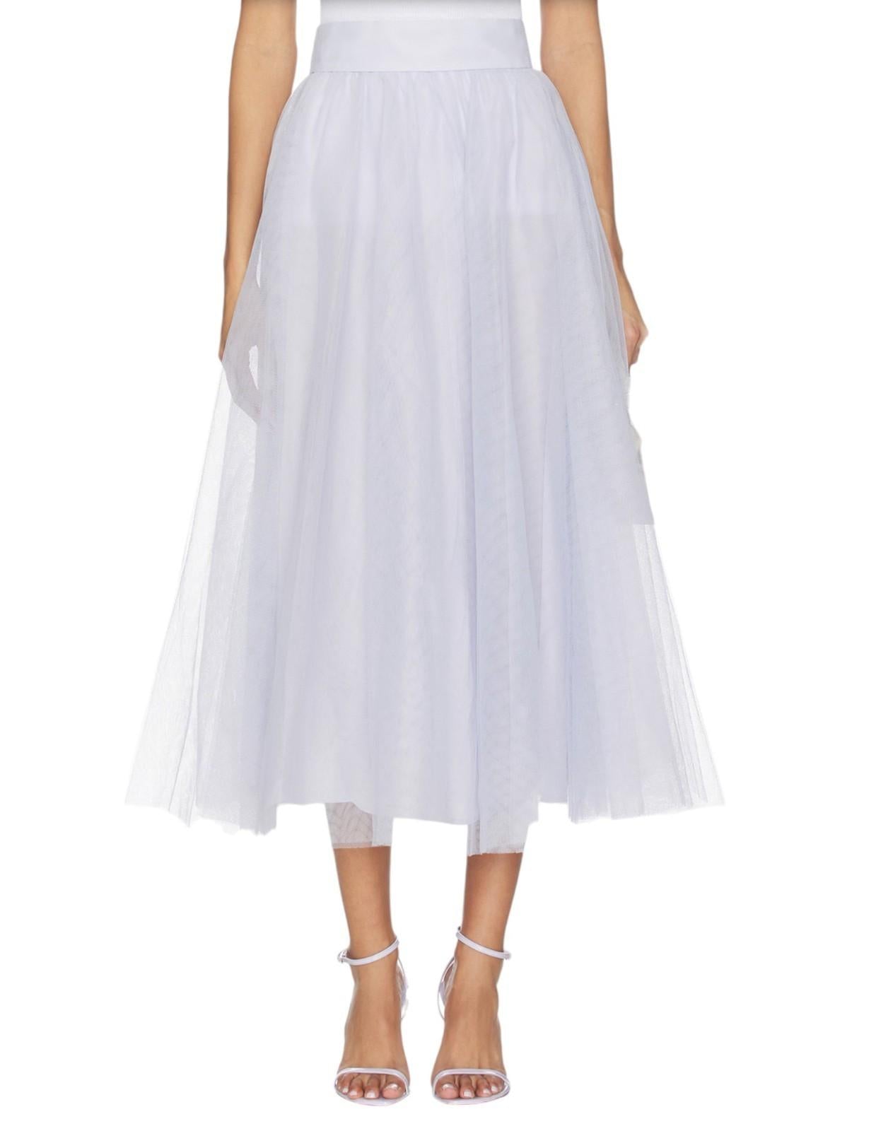 White tulle skirt worn by a model on a white background