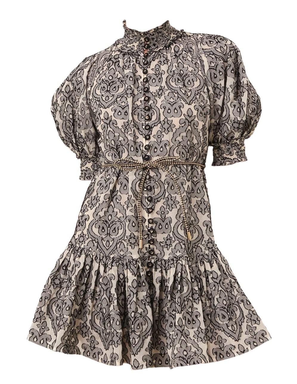 Patterned dress with puff sleeves on a white background