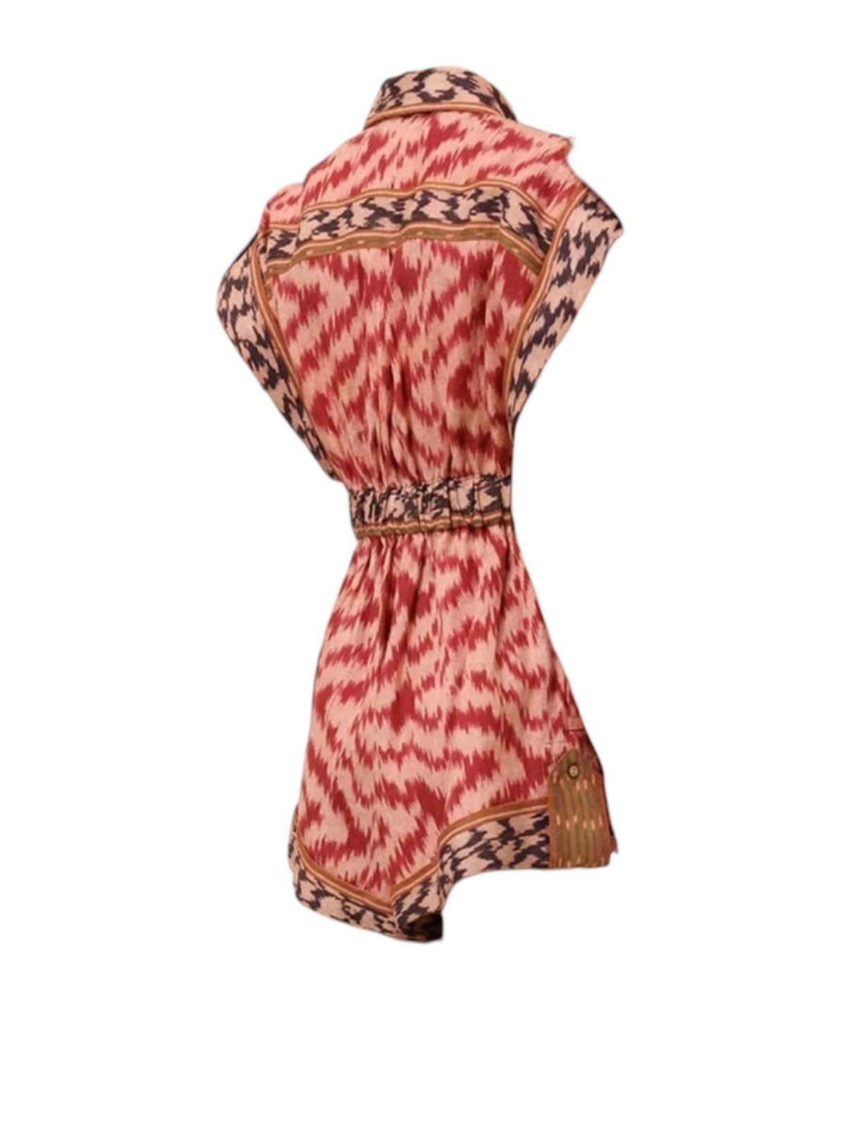 Red and brown patterned dress on a white background