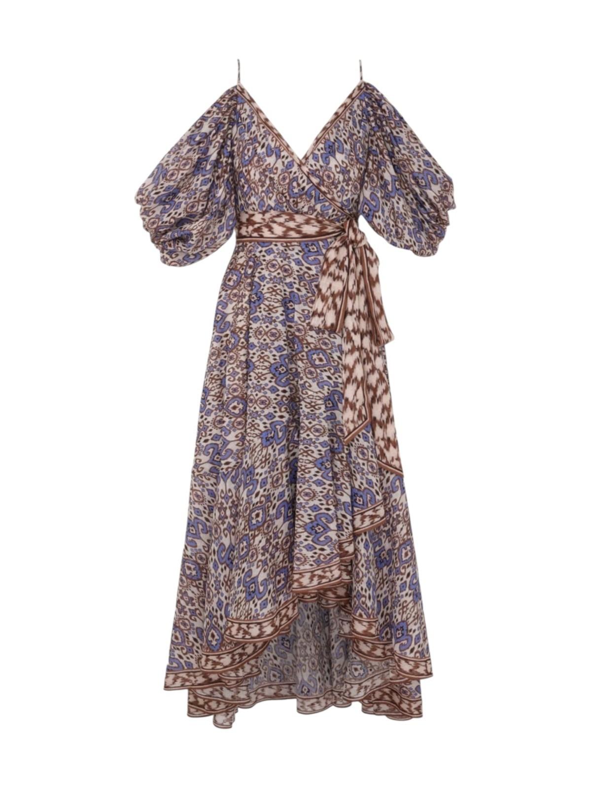 Floral patterned dress with puff sleeves on a white background