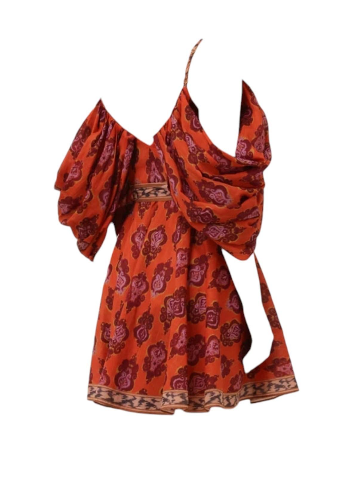 Red patterned dress with puff sleeves on a white background