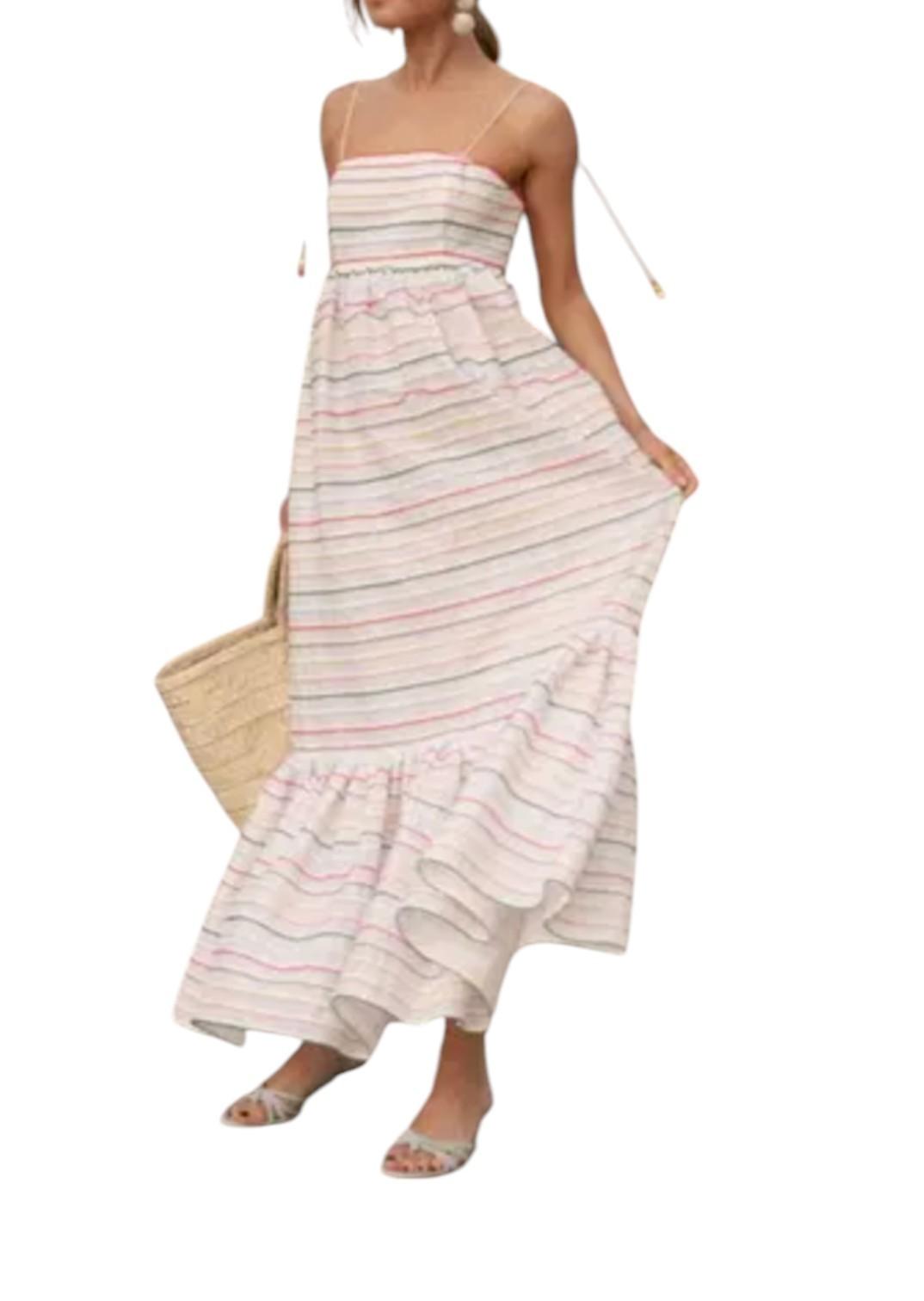 Woman wearing a striped dress with a white background