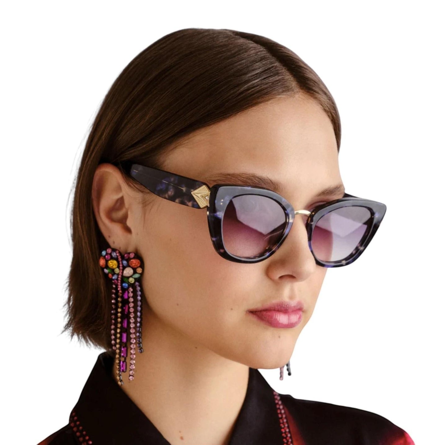 Naked Pear Camilla Nile Goddess cat eye sunglasses in navy tortoise shell acetate with gold metal accents on a model