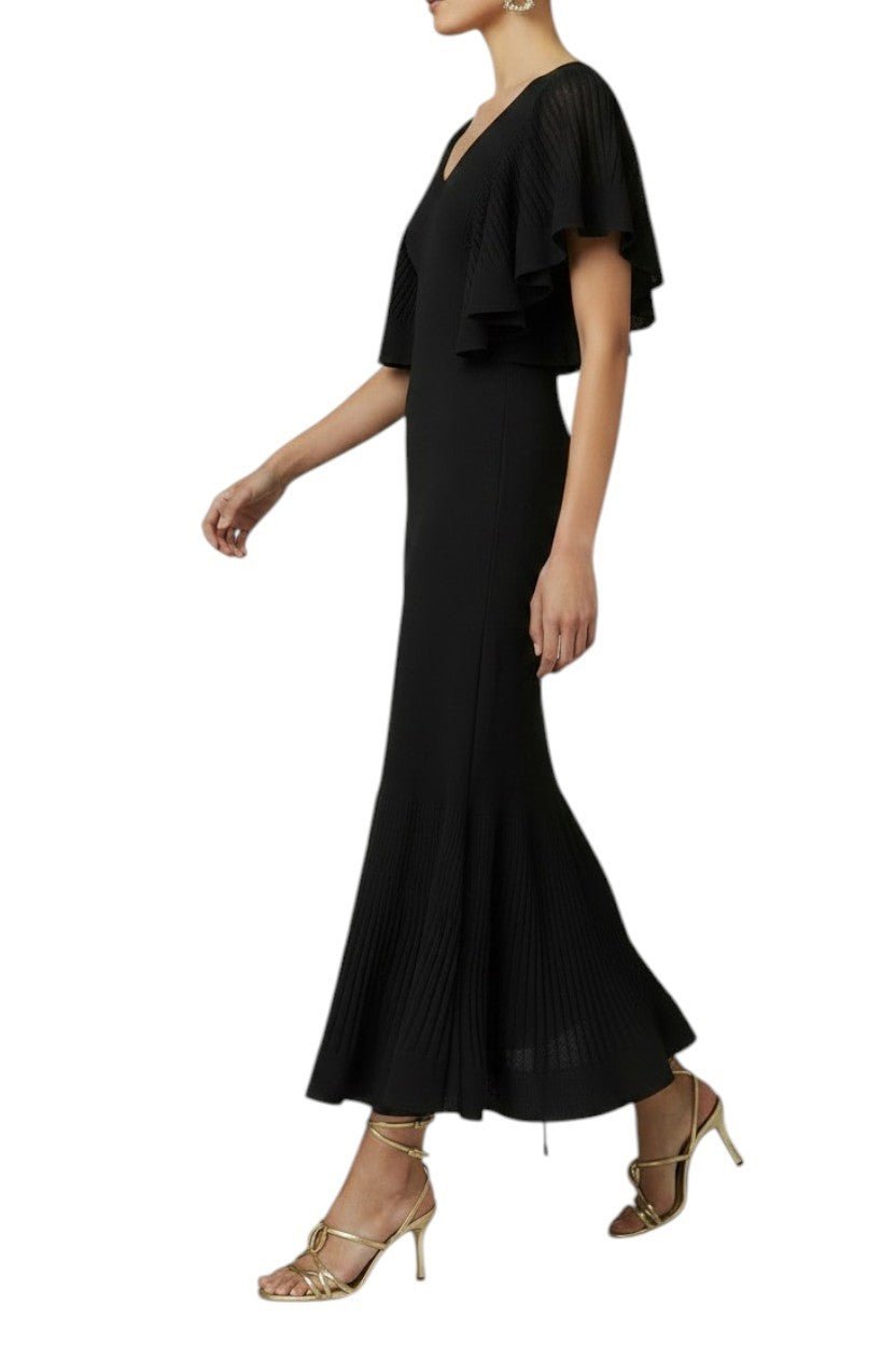 Naked Pear Zimmermann black knit midi dress with V-neck, flutter sleeves, and ribbed texture on a model