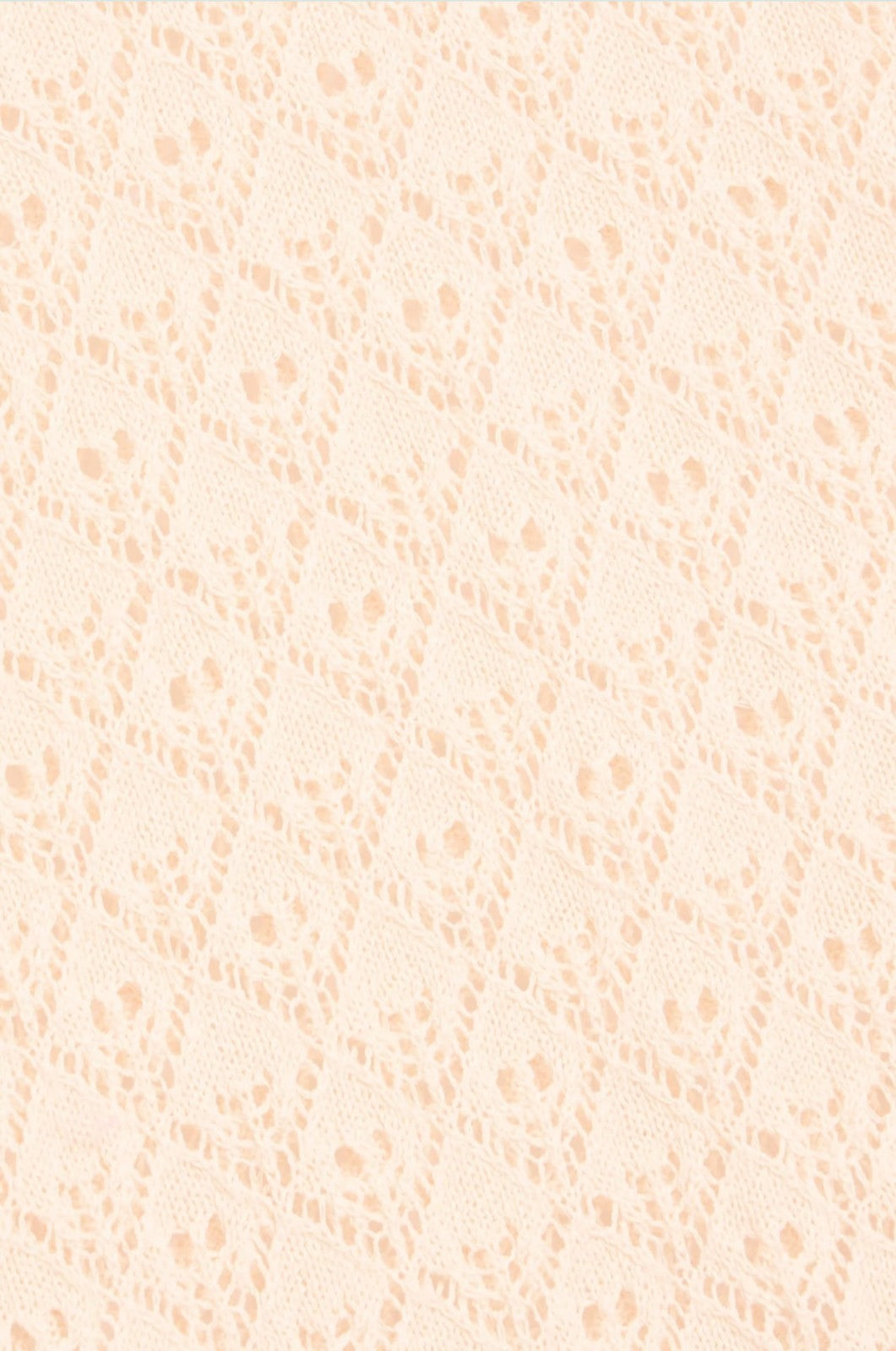 Naked Pear Zimmermann cream pointelle knit fabric texture with intricate diamond pattern