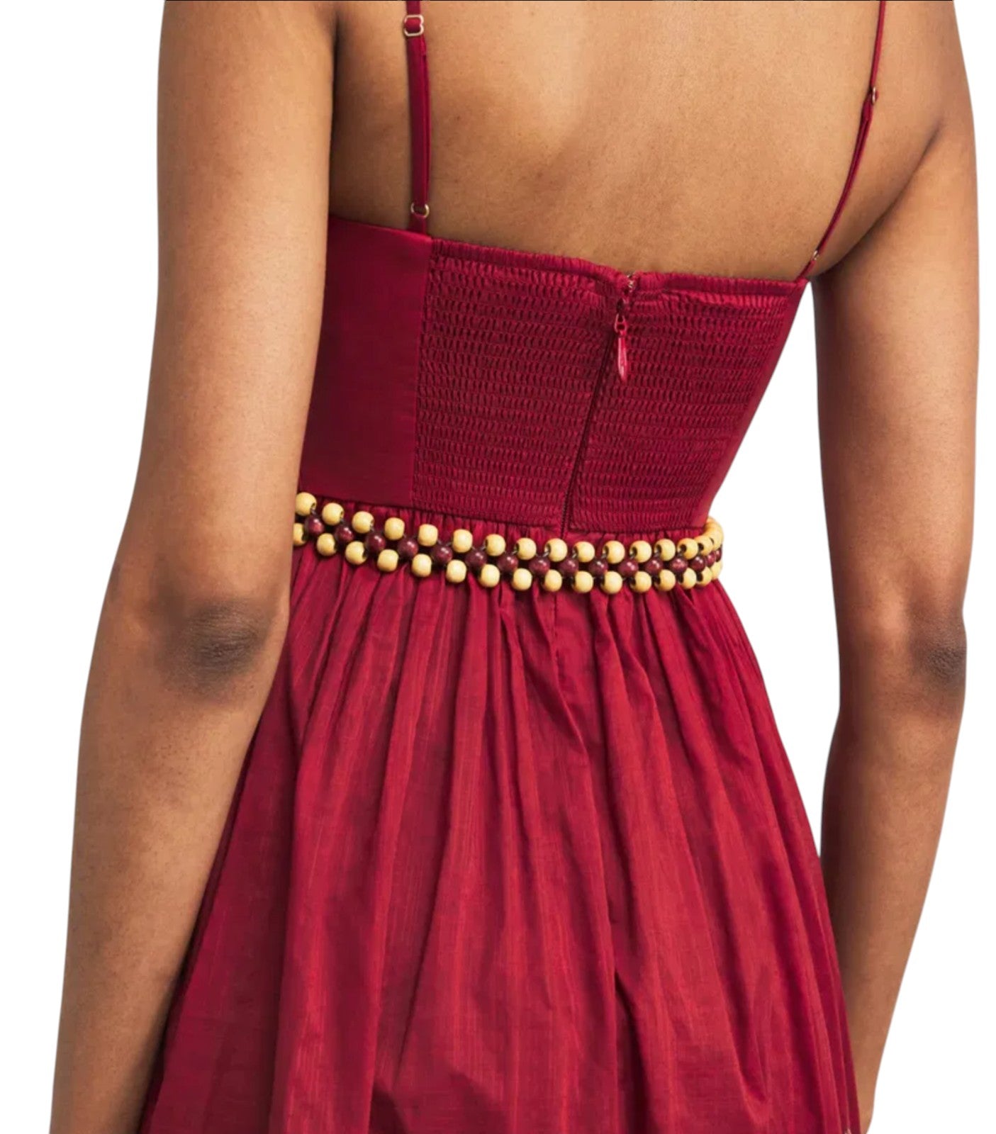 Back view of Naked Pear Zimmermann Rhiannon red cotton midi dress with a beaded belt and smocked corset bodice