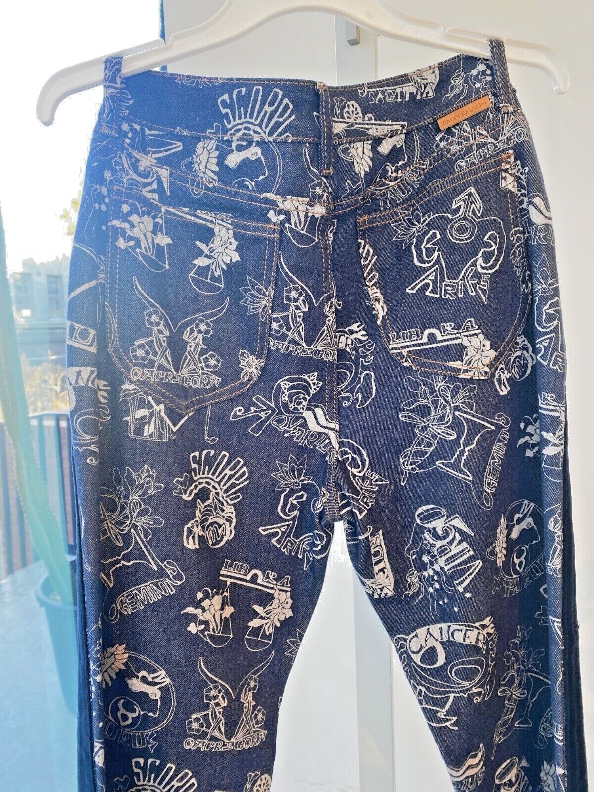 Zimmermann Kaleidoscope Stovepipe Jeans | Zodiac Print, Side Panels, High Waist